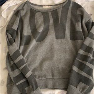 Cute love sweater.